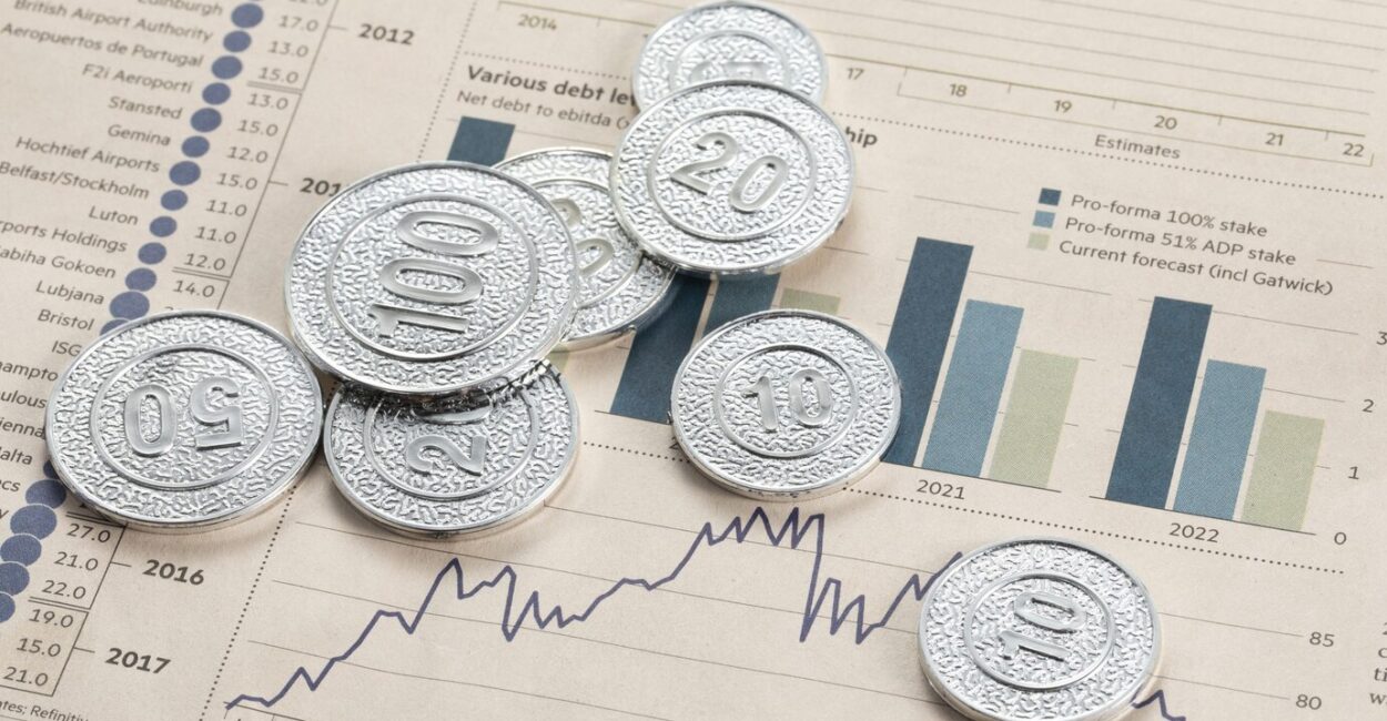 high-angle-shot-silver-coins-pages high-angle-shot-silver-coins-pages